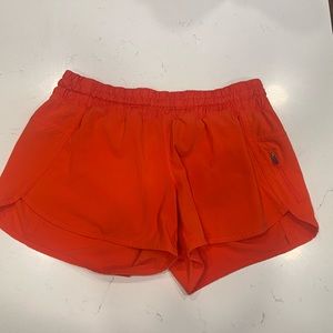 Lululemon coral orange running shorts size 10